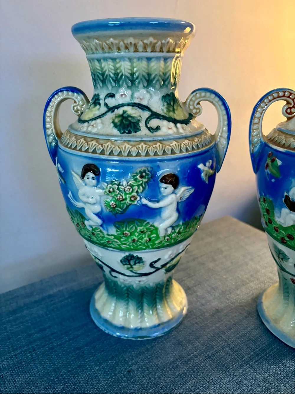 Source Unknown Blue and Green Cherub Relief Vases (Pair)